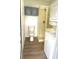 Bathroom with shower, toilet and stacked washer/dryer at 916 S Park Ct, Kissimmee, FL 34741