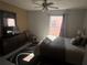 Bedroom with full-size bed, window and new carpet at 922 Sandy Ridge Drive Dr, Davenport, FL 33896