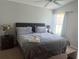 Spacious bedroom with king-size bed and neutral color scheme at 922 Sandy Ridge Drive Dr, Davenport, FL 33896