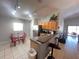 Bright kitchen with stainless steel appliances and breakfast nook at 922 Sandy Ridge Drive Dr, Davenport, FL 33896