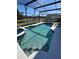 Enjoy refreshing dips in the sparkling pool with built-in spa at 922 Sandy Ridge Drive Dr, Davenport, FL 33896