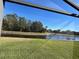Private backyard oasis with a pond view at 922 Sandy Ridge Drive Dr, Davenport, FL 33896