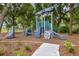 playground with climbing wall and slides at 1742 Carnelian St, Deland, FL 32720