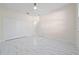 Bright bedroom with double doors leading to another room and marble-look floors at 2828 Sequoyah Dr, Haines City, FL 33844