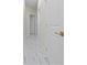 Bright hallway with marble-look tile floors and elegant gold door hardware at 2828 Sequoyah Dr, Haines City, FL 33844