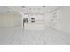 Modern kitchen with white cabinets, stainless steel appliances, and a large island at 2828 Sequoyah Dr, Haines City, FL 33844