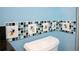 Mickey Mouse themed bathroom with custom tile and granite at 453 Water St, Kissimmee, FL 34747