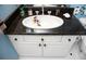 Bathroom vanity with Mickey Mouse sink and granite countertop at 453 Water St, Kissimmee, FL 34747