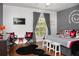 Mickey Mouse themed bedroom with king-size bed, and two Mickey Mouse chairs at 453 Water St, Kissimmee, FL 34747