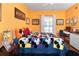 Bright bedroom with Mickey Mouse bedding and a workspace at 453 Water St, Kissimmee, FL 34747