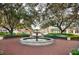 Quaint community fountain with benches and landscaping at 453 Water St, Kissimmee, FL 34747
