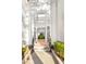 Building courtyard with archways, walkways, and lush landscaping at 453 Water St, Kissimmee, FL 34747