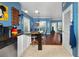 Kitchen features stainless steel appliances and a view of the dining area at 453 Water St, Kissimmee, FL 34747