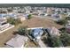 Aerial view of house, neighborhood, and surrounding landscape at 513 Big Black Way, Kissimmee, FL 34759