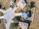 Aerial view of a house with solar panels and a fenced backyard at 513 Big Black Way, Kissimmee, FL 34759