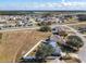 Aerial view showcasing a house in a residential neighborhood at 513 Big Black Way, Kissimmee, FL 34759