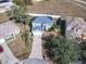 Aerial view of house with solar panels and driveway at 513 Big Black Way, Kissimmee, FL 34759