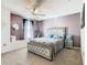 Elegant bedroom with upholstered bed and window seat at 513 Big Black Way, Kissimmee, FL 34759