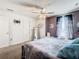 Spacious bedroom with plush bedding and ceiling fan at 513 Big Black Way, Kissimmee, FL 34759