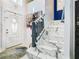 Bright entryway with a marble staircase and a modern white door at 513 Big Black Way, Kissimmee, FL 34759