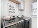 Convenient laundry room with Samsung washer and dryer at 513 Big Black Way, Kissimmee, FL 34759