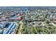 Aerial view of property location within a community near a lake at 5980 Westgate Dr # Apt 103, Orlando, FL 32835