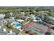 Community features tennis courts, pools, and green space at 5980 Westgate Dr # Apt 103, Orlando, FL 32835
