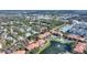 Aerial view highlighting property location near pool and lake at 5980 Westgate Dr # Apt 103, Orlando, FL 32835