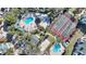 Two pools, tennis courts, and a community area at 5980 Westgate Dr # Apt 103, Orlando, FL 32835