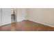 Spacious bedroom with hardwood floors and an ensuite bathroom at 5980 Westgate Dr # Apt 103, Orlando, FL 32835