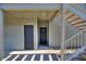 Private entryway with storage closet and exterior stairs at 5980 Westgate Dr # Apt 103, Orlando, FL 32835