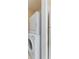 Stackable washer and dryer in laundry closet at 5980 Westgate Dr # Apt 103, Orlando, FL 32835