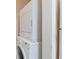 Stackable washer and dryer in laundry closet at 5980 Westgate Dr # Apt 103, Orlando, FL 32835
