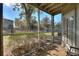 Private screened porch with access to the backyard at 5980 Westgate Dr # Apt 103, Orlando, FL 32835