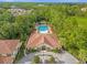 Community pool with lounge chairs and a surrounding patio area at 8121 Roseville Blvd, Davenport, FL 33896