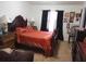 Spacious bedroom with a large bed and ample storage at 10407 Sw 85Th Ct, Ocala, FL 34481