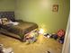 Second bedroom with a bed and toys at 10407 Sw 85Th Ct, Ocala, FL 34481