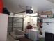Garage with extra storage space and laundry hookups at 10407 Sw 85Th Ct, Ocala, FL 34481