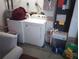 Laundry room with washer, dryer, and extra storage at 10407 Sw 85Th Ct, Ocala, FL 34481