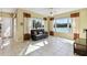 Bright Gathering room with a comfortable couch and lake view at 256 New River Dr, Poinciana, FL 34759