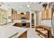 Spacious kitchen with ample wood cabinets and drawers at 256 New River Dr, Poinciana, FL 34759