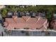 Top-down view of townhouses with tiled roofs and private patios at 2627 Bugatti Ct, Kissimmee, FL 34746