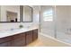 Bathroom with a tub and shower at 2627 Bugatti Ct, Kissimmee, FL 34746
