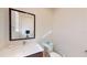 Clean bathroom with a single sink vanity and toilet at 2627 Bugatti Ct, Kissimmee, FL 34746