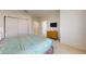 Bright bedroom with a comfortable bed and ample closet space at 2627 Bugatti Ct, Kissimmee, FL 34746
