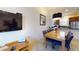 Spacious dining area with table and chairs, open to the kitchen at 2627 Bugatti Ct, Kissimmee, FL 34746