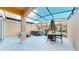 Screened patio with hot tub and seating area at 2627 Bugatti Ct, Kissimmee, FL 34746