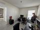 Bright home office with desk and chair, offering a workspace at 2843 Turnstone Run, Harmony, FL 34773