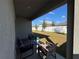 Relaxing patio with seating area, overlooking the backyard at 2843 Turnstone Run, Harmony, FL 34773