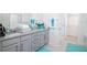 Bathroom boasts double vanity, granite countertop, and walk-in closet at 2937 Hooded Crane Cv, Harmony, FL 34773